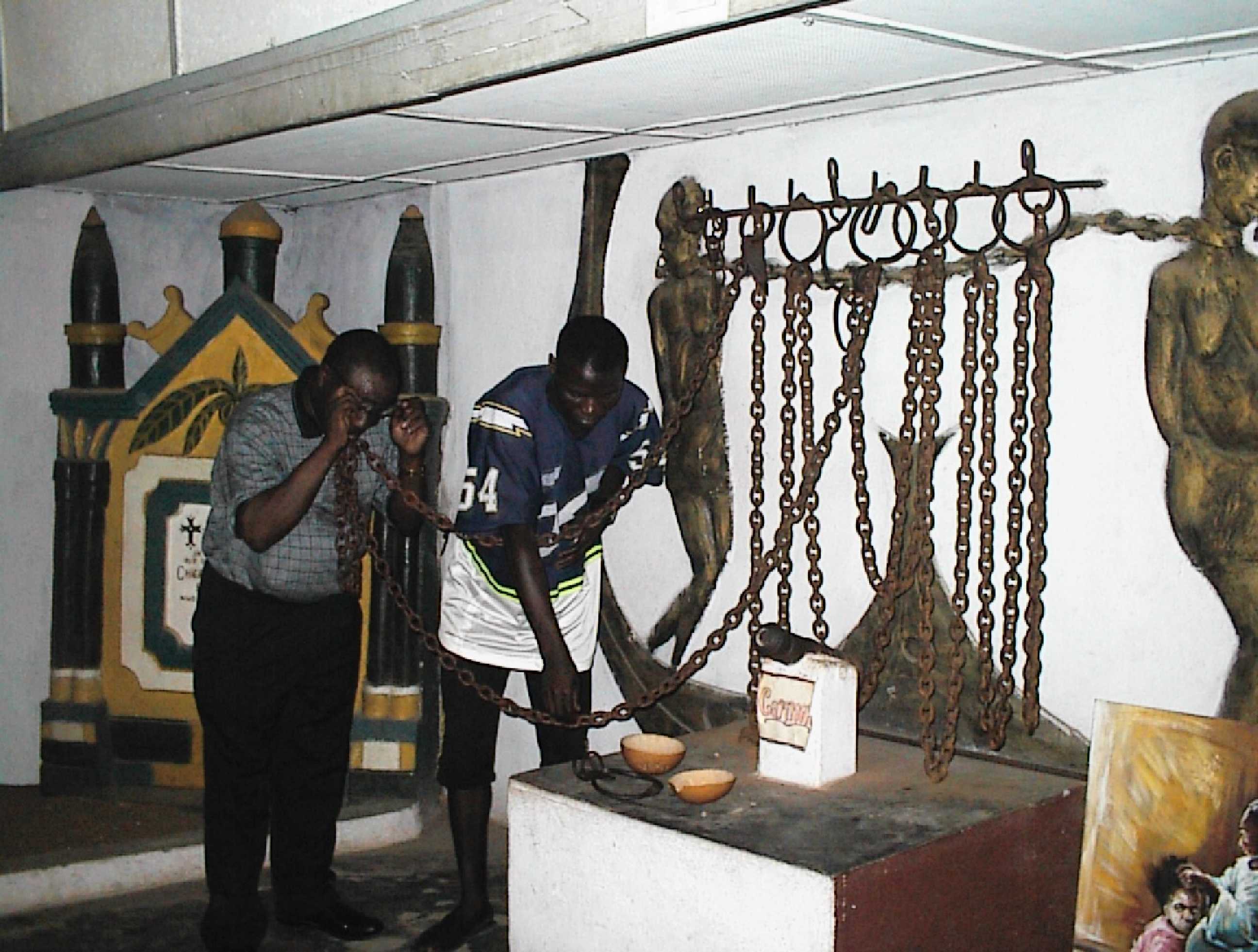 Njoku trying out the chains in the Mobe Family House Museum