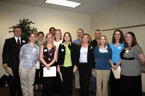 Chi Sigma Iota Members Group shot of Chi Sigma Iota in a meeting room