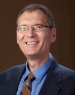 Dr. Dennis George
