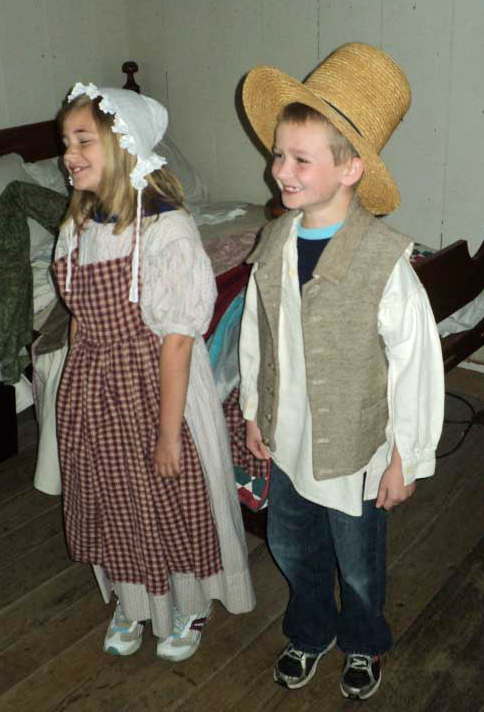 Felts House and kid's in costume children in costume