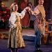 Karsyn Rohach and Nathan Fister as villagers, dance to entertain the three Kings. 