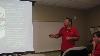 Matt Atkinson updates the staff about what he learned and the sessions he attended.