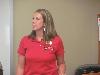 Megan Paschall updates the staff about what she learned and the sessions she attended.