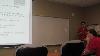 Kim Phillps updates the staff about what she learned and the sessions she attended.