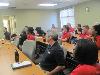 Megan Paschall updates the staff about what she learned and the sessions she attended.