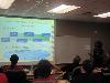 Jataun Isenhower updates the staff about what she learned and the sessions she attended.