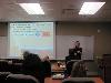 Kathryn Steward updates the staff about what she learned and the sessions she attended.