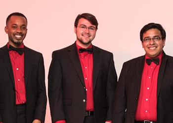 Group of Men Wearing Red Shirts and Bow Ties