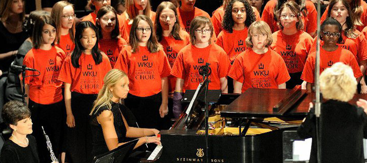 A community children's chorus was formed by Dr. Robyn Swanson, with public school assistance from Jeanie Orr and Andrea Brown, resulting in a performance in Van Meter with the WKU Choirs