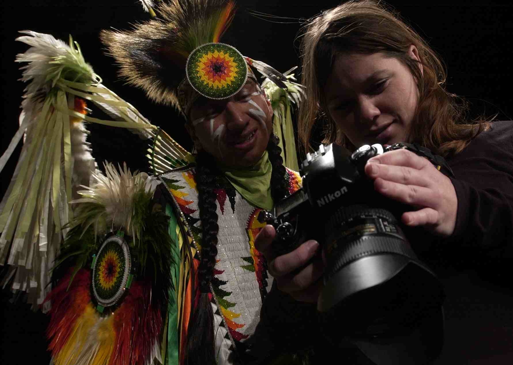 photojournalist/anthropologist with native dancer