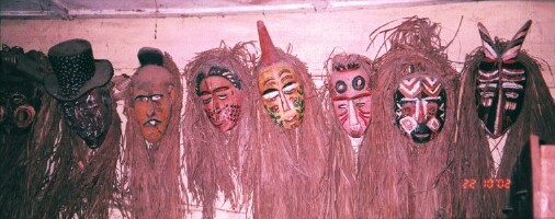 Okwanko ancestral masks in the Ndi Mba compound hall