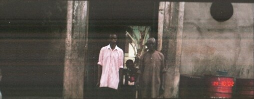 Mr. Brown Eke Kalu (right) and his brother in front of their father's house