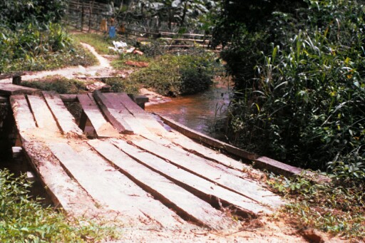 A wooden bridge replacing a footbridge in the former slave trade route