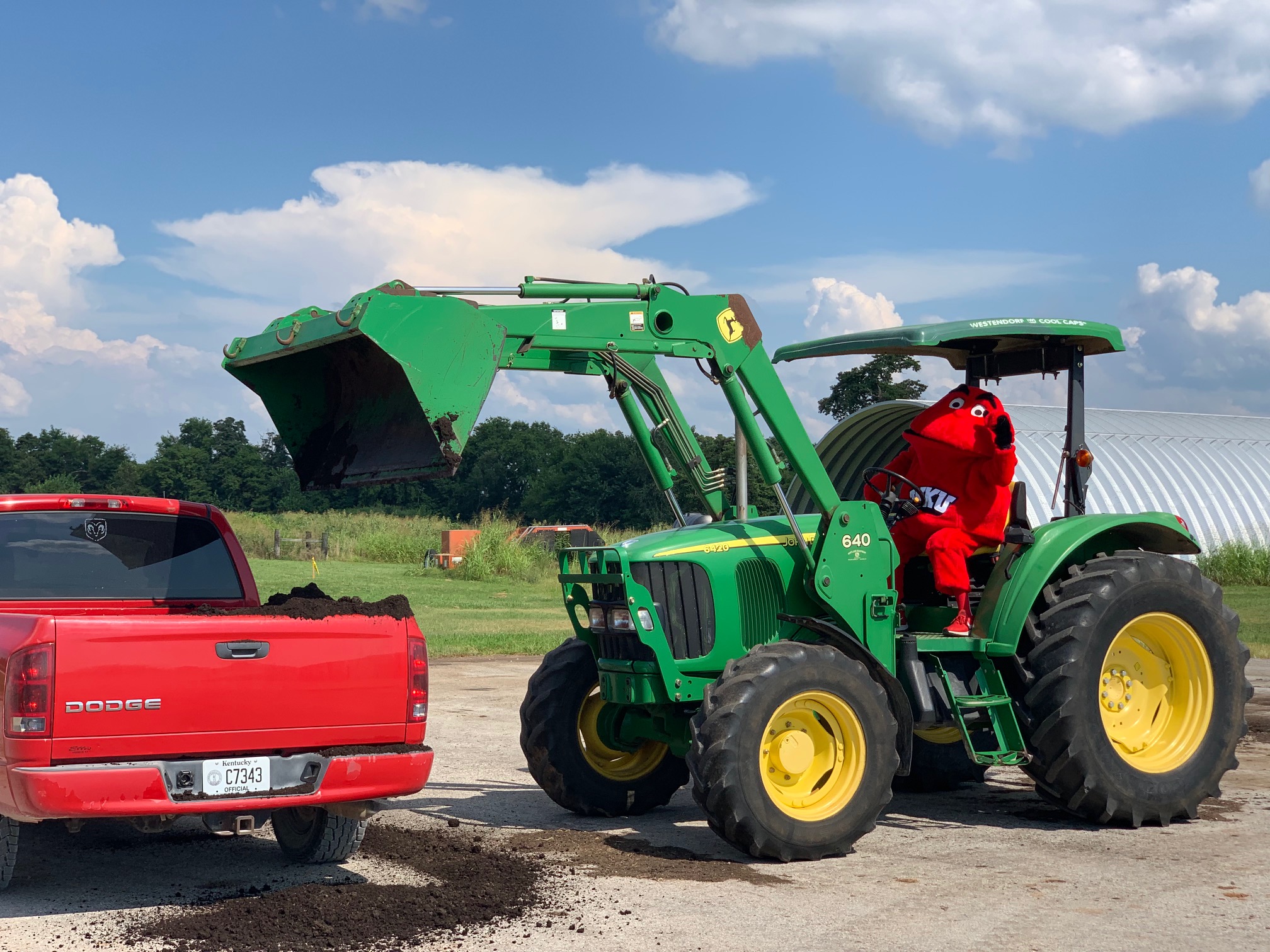 Big Red drives Mulch Tractor