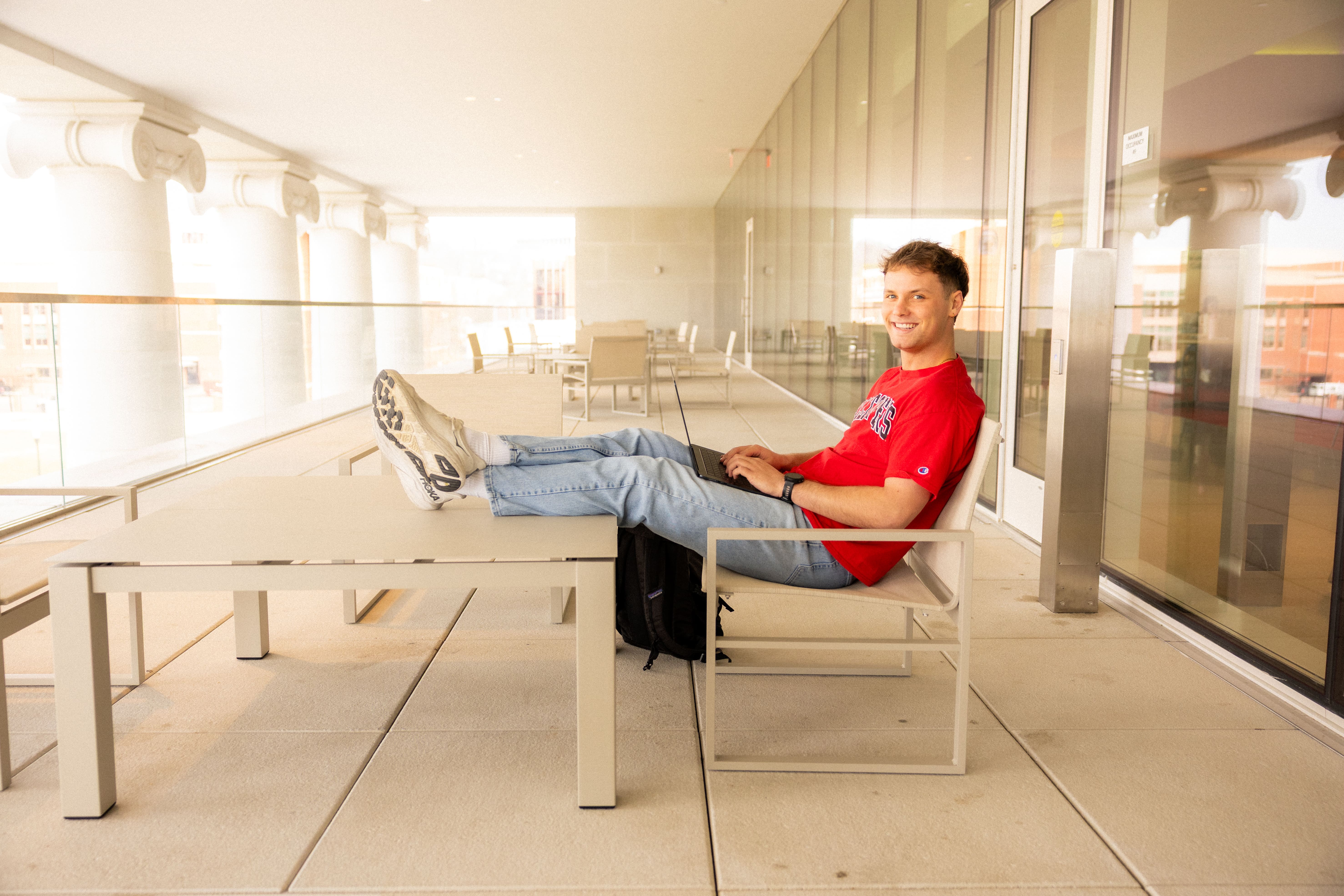 A Western Kentucky University student works on a laptop.