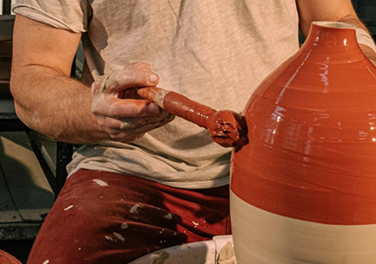 Man making vase