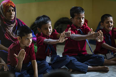 Deaf children learn signing at an early intervention center in Bangladesh (Deaf Child Worldwide; https://www.globalpartnership.org/blog/deaf-children-poor-communities-have-right-world-class-education-too)