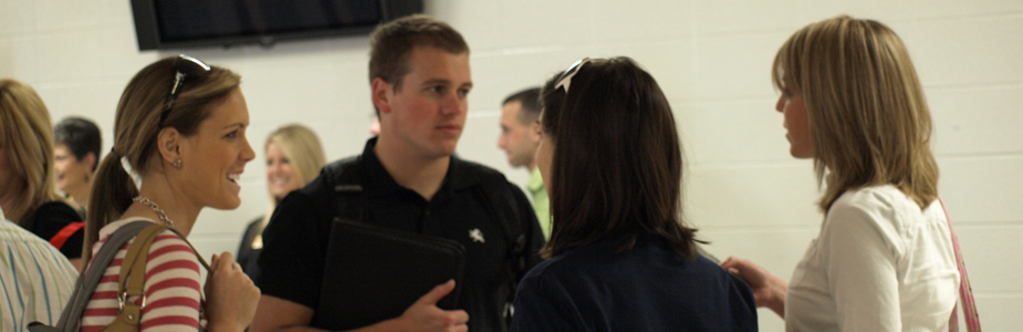 Photo of students conversing during Business Careers Day.