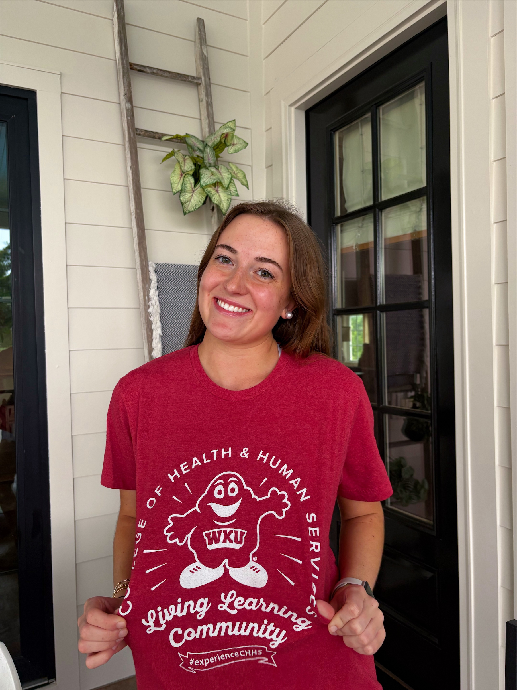 student in a red t-shirt