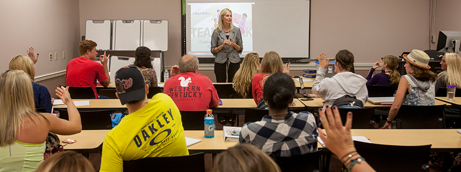 Dr. Jennifer Mize Smith instructing COMM course