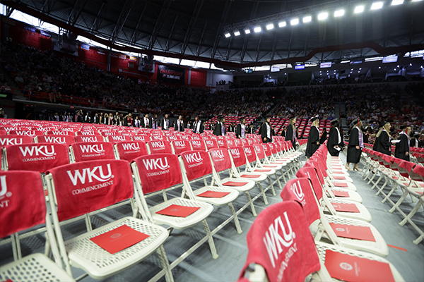 WKU Graduates walking into Diddle Arena