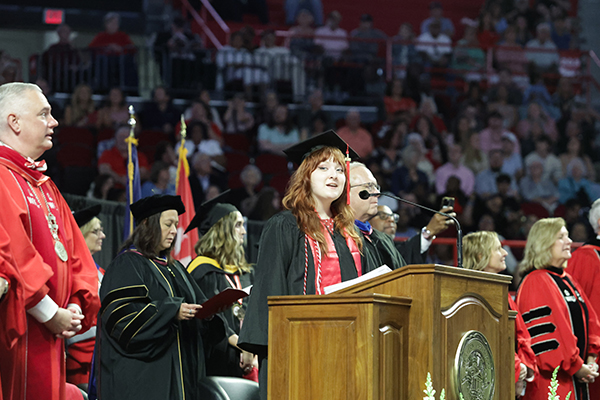 graduate singing the WKU alma mater