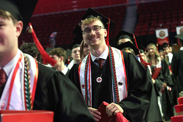 graduate wearing honor cords and stoles at wku graduation