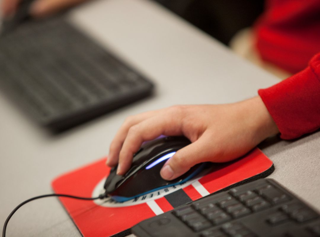 Student using computer mouse