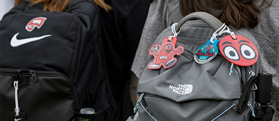 Image of two backpacks with Big Red key chains