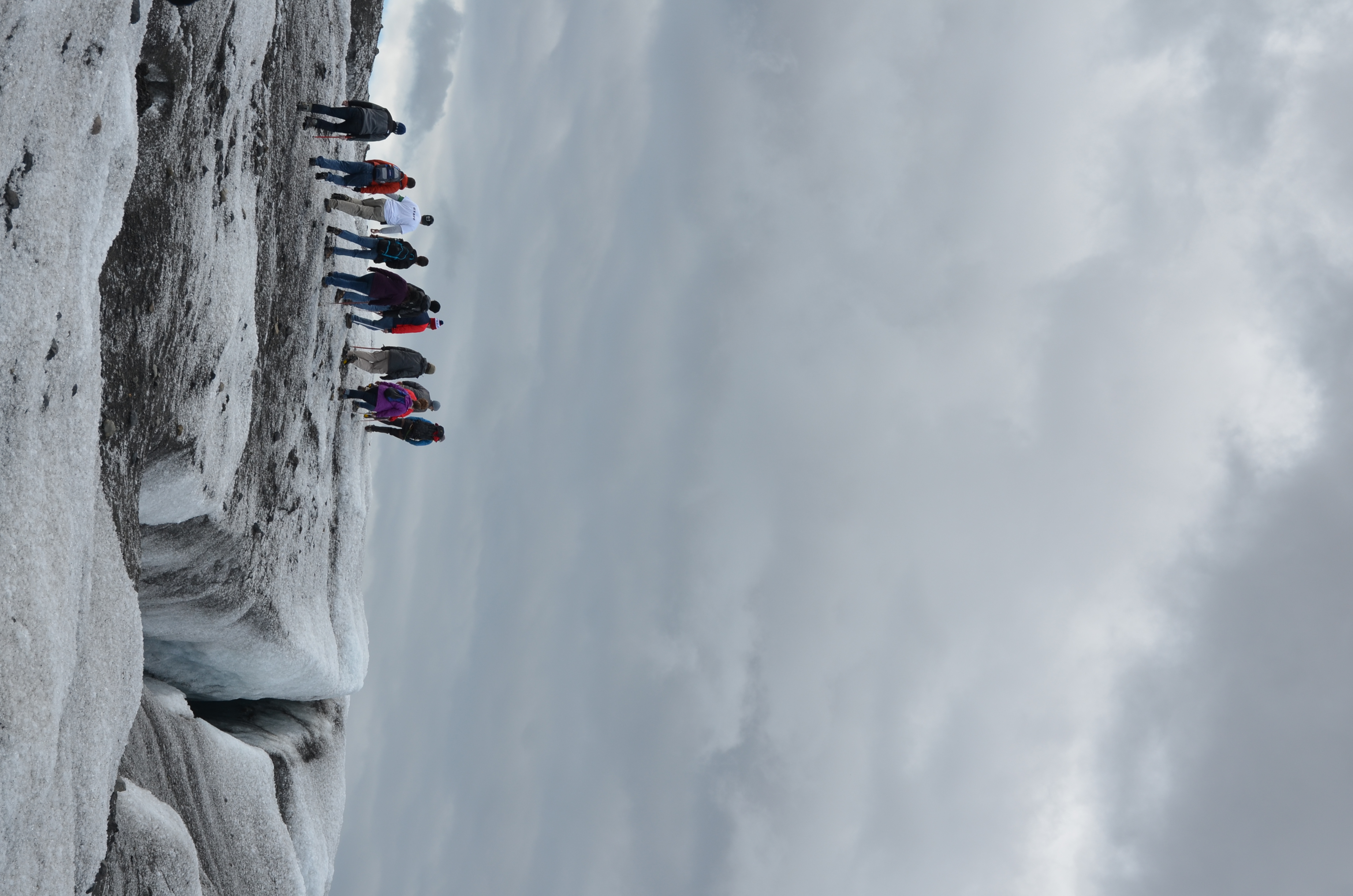 Students trekking in icy terrain