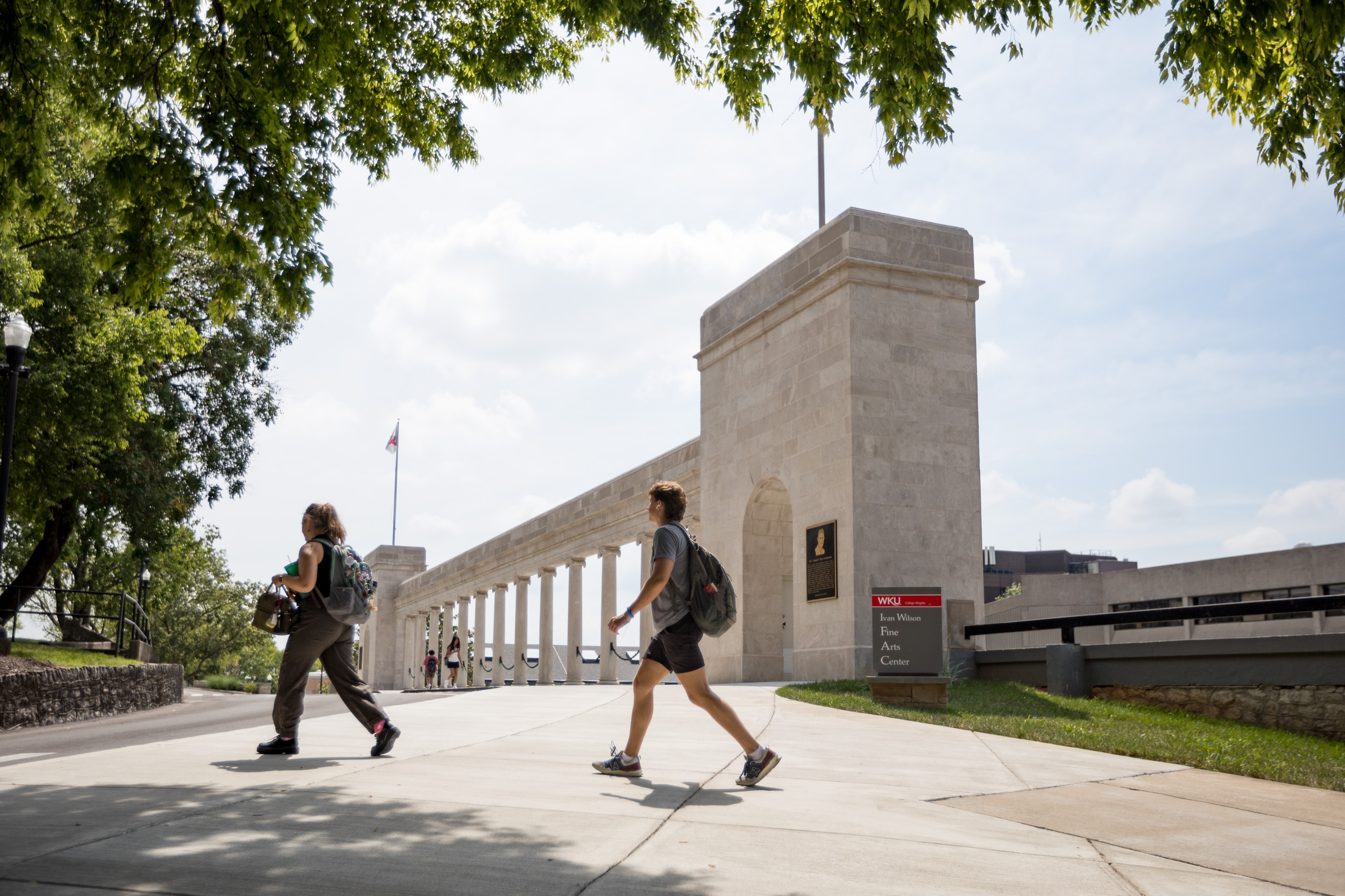 Students walking to class past the WKU Colonnade.