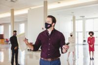 Director Ganer Newman addressing the team during warm-ups before AFA virtual out-rounds.