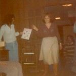 December 1978, Melayna Brown receiving the “You’ve Come a Long Way Baby” award from her debate and duo partner, Roxanne Seiler (now Cordonier), looking on seated Brent Shockley, @ Forensic Union Christmas Party @ Larry Caillouet’s