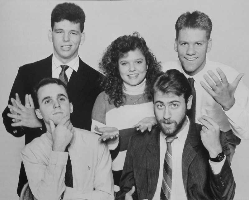 1990 - (clockwise from center) Mindy Mason, Travis Holtrey, Rand Huguely, Eric D. Shoemaker, and Jay Newell
