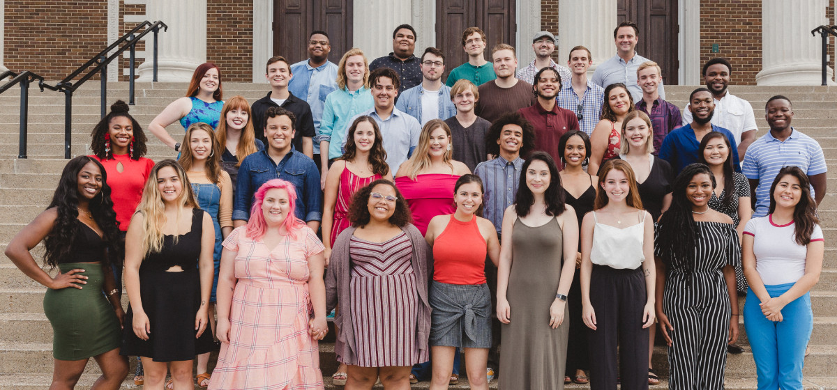 2019-20 WKU Forensic Team standing in fromt of VanMeter Auditorium