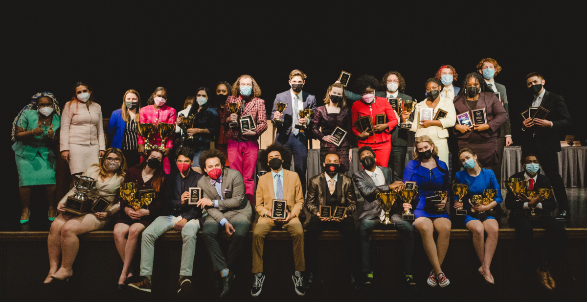 2021-22 WKU Forensic Team holding awards from NFA at the end of the competition year