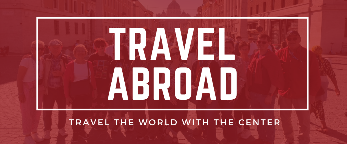 red graphic with an image of a group of people in the background smiling at the camera. Superimposed over the image is a white box with white text reading Travel Abroad. Below that box is text reading Travel the World With the Center