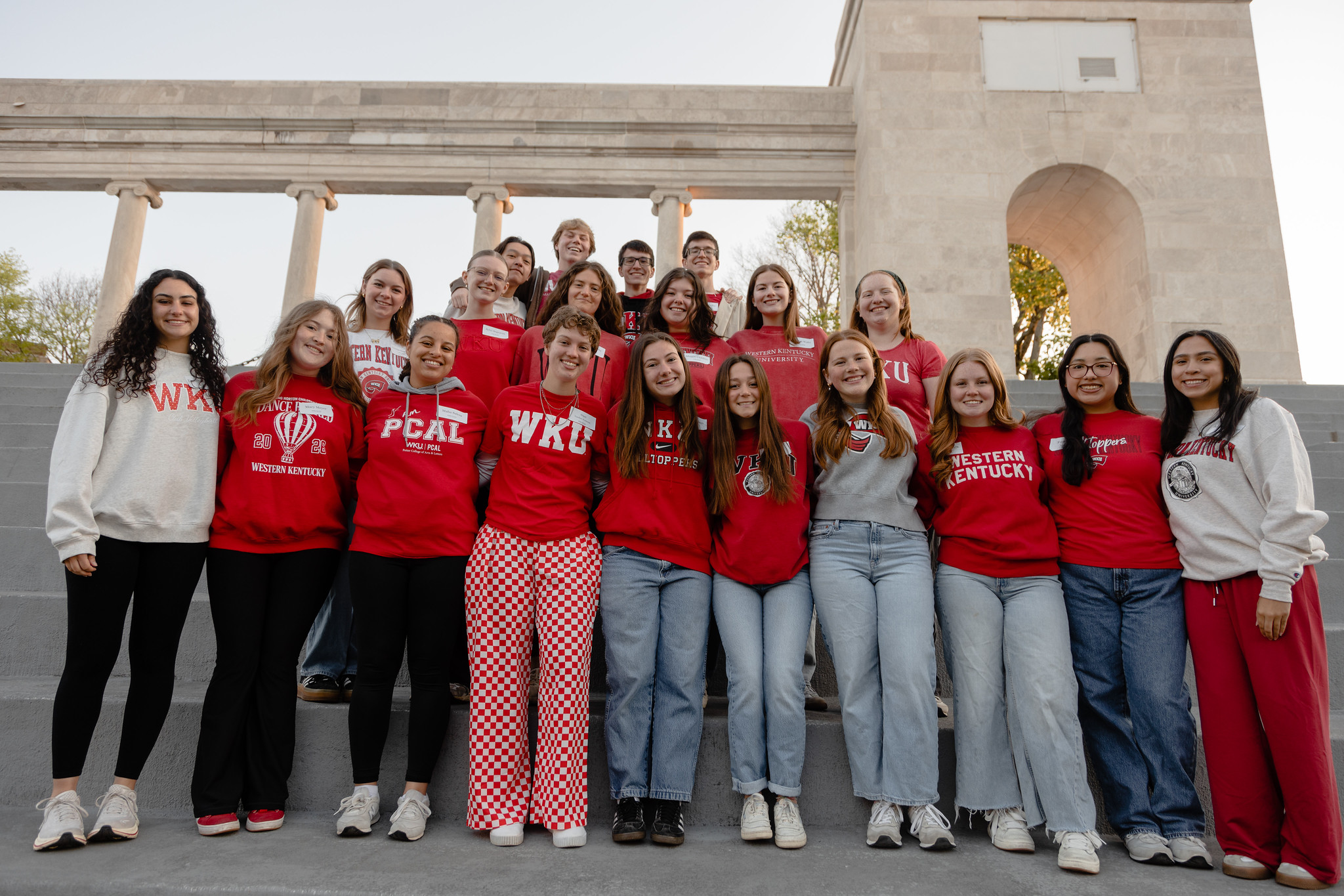 a large group of WKU students posing on the steps of the Colonnade