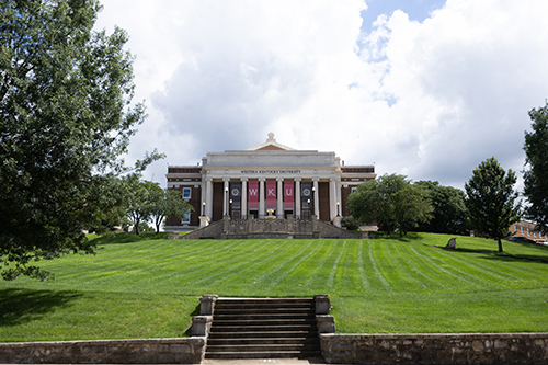 Van Meter Hall with banners that say W-K-U