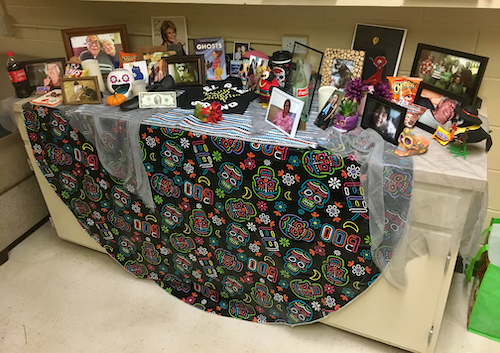 Graduate Student Camille Acosta Prepares Dia de los Muertos Altar