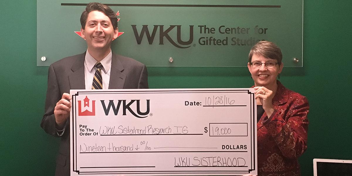 Stode and Kirby Stokes with check