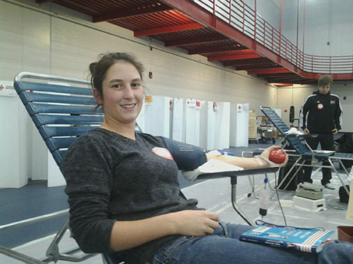 Women's Rugby donating blood at the WKU vs MTSU Blood Drive.