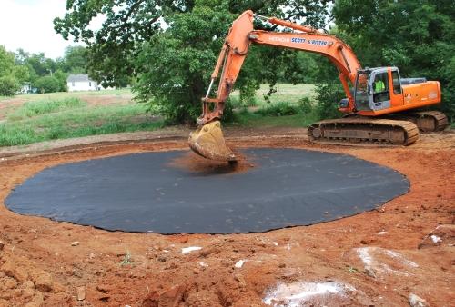 covering liner with top soil