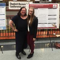 View Anna is standing with her mentor, Janice Smith, in front of her poster at the 2019 Student Research Conference Larger