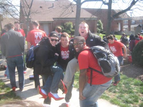 Showing off their red pumps in support of Walk-A-Mile In Her Shoes 2013
