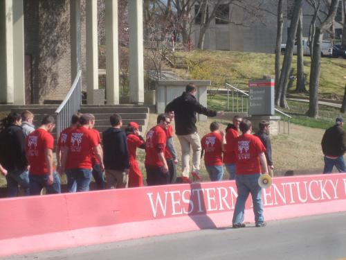 And the mile begins in those red high heels!