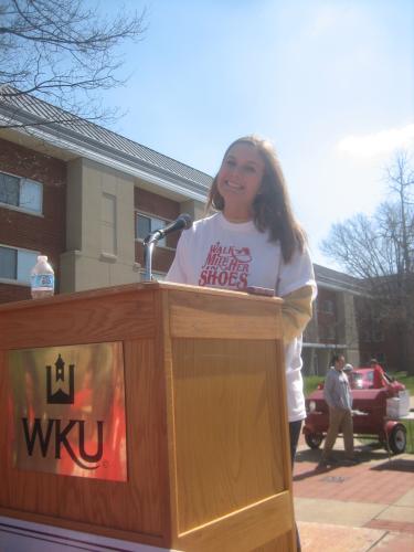 Activities Director for Panhellenic, WKU student Abby Blandford, congratulates the male students at WKU for Walk-A-Mile In Her Shoes 2013
