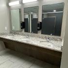 Three sinks inside the Normal Hall community bathroom