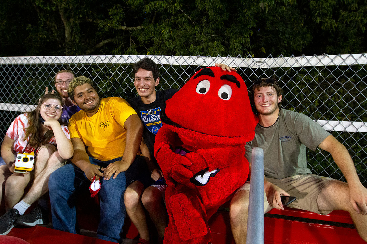 During a WKU soccer game, Big Red visited students in the School of Media LLC. Students went to the game together after a tailgate party outside their residence hall.
