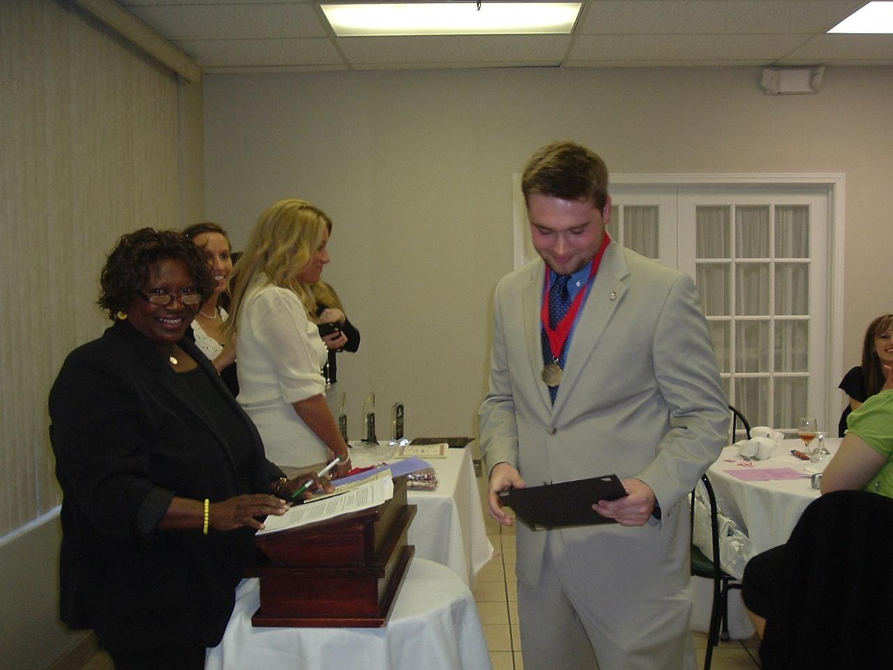 Dr. Ardrey gives out awards.